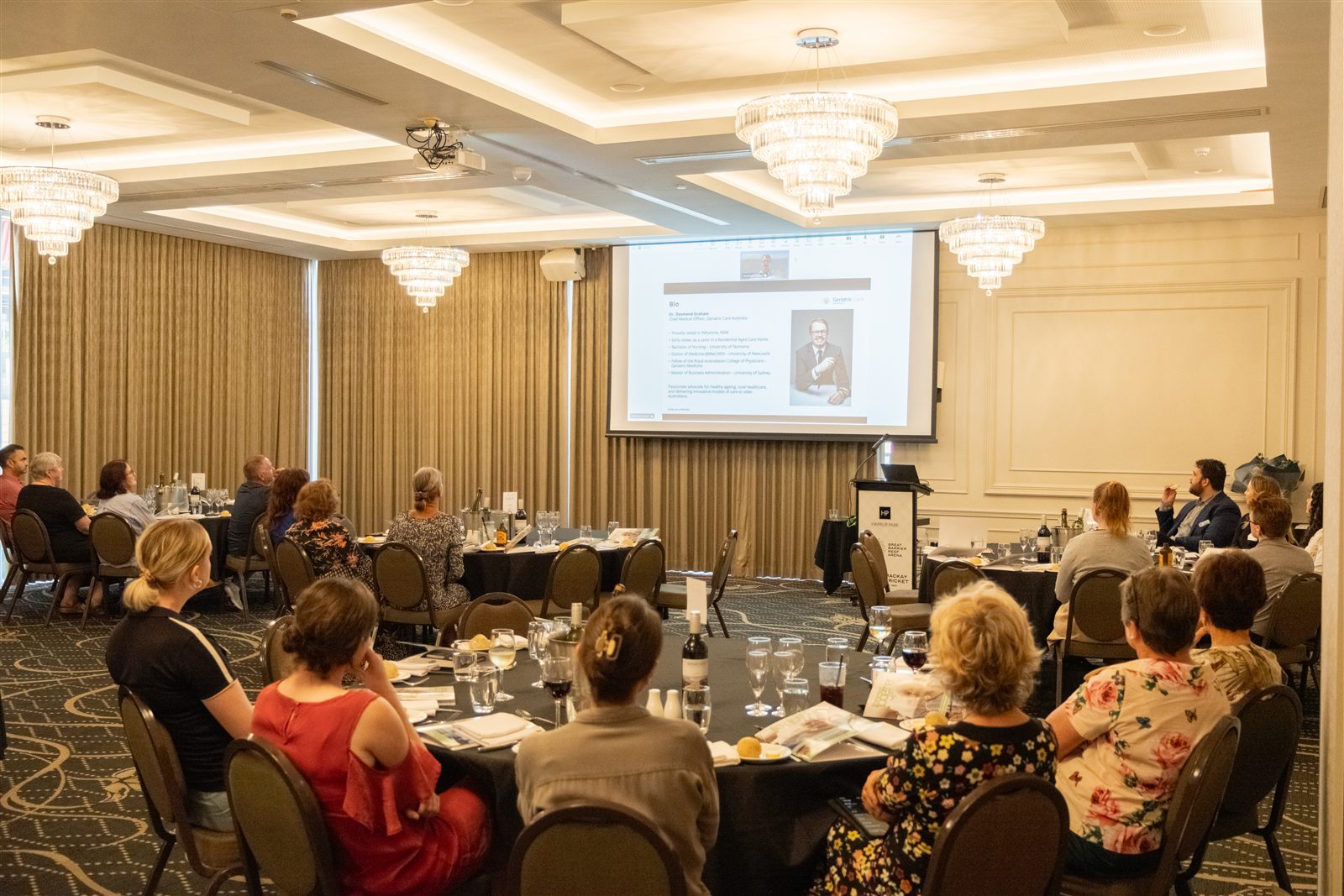 Conference videographer covering a corporate event in Mackay