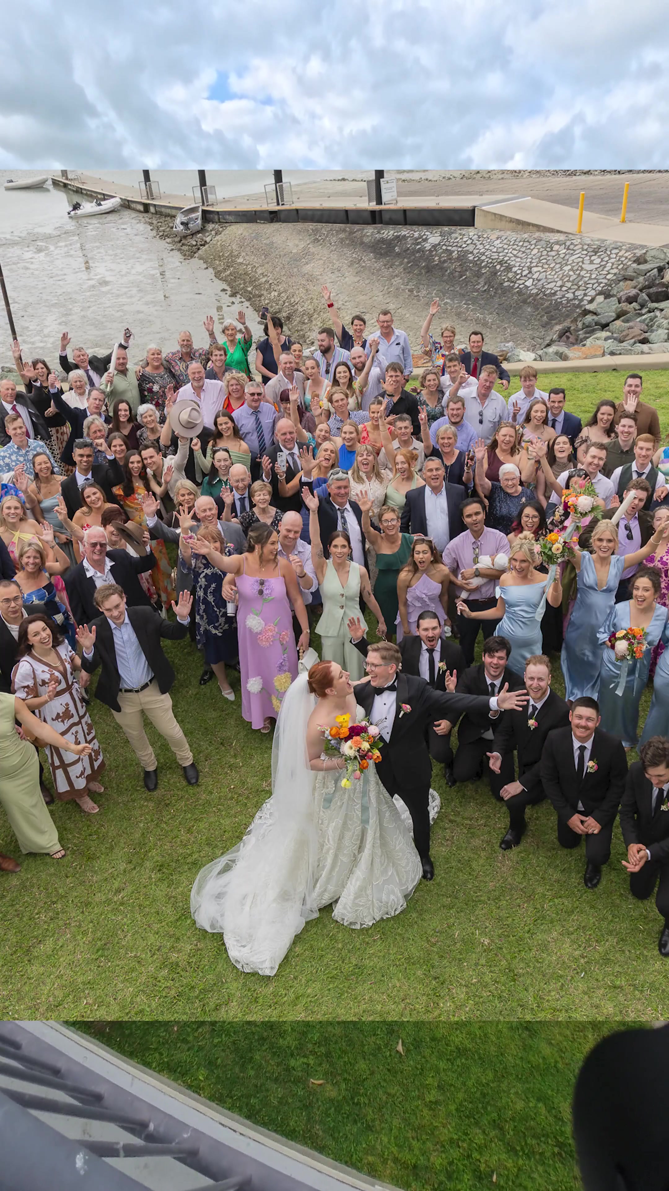 Wedding crowd celebrating with the couple