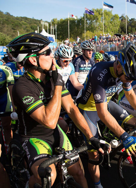 Cyclist kissing his own hand (joke it's to the crowd) Noosa Tri (I think). Can't remember the year. By Jordan Cullen, Mackay Photographer & Filmmaker.